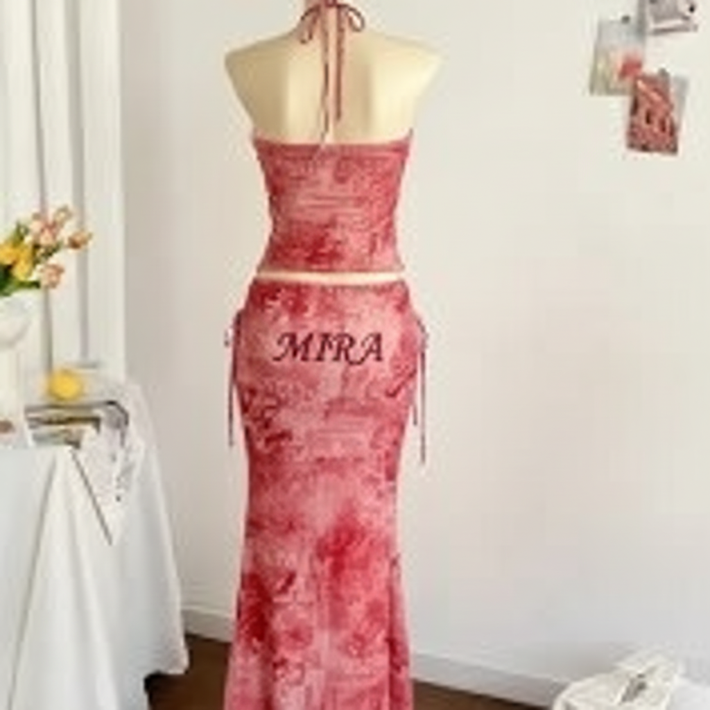 Pink dress with MIRA on back