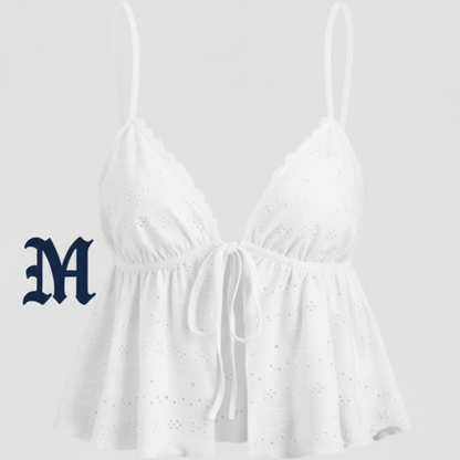 White ruffled top with M on side